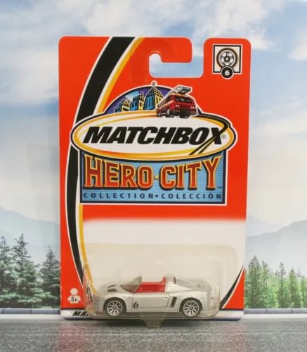 Matchbox Hero City diecast car on card, silver speedster with number 6
