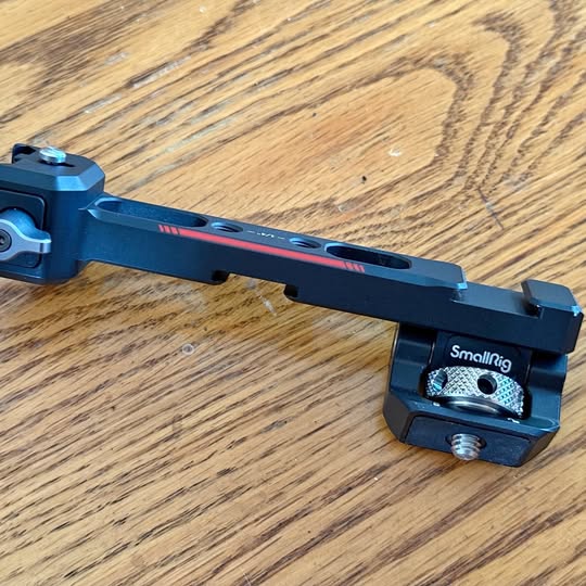 SMALLRIG monitor arm with blue finish and adjustable mounting plate