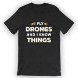 Unisex black graphic T-shirt with slogan 'I Fly Drones and I Know Things'