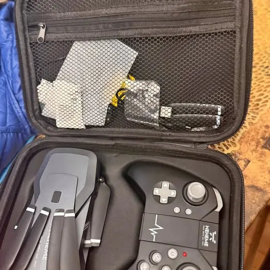 Drone with camera accessories case with controller and cables