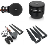 Drone motor with propellers, black motor housing and four dark blades