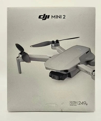 DJI Mini 2 drone in original box with dual propellers and camera