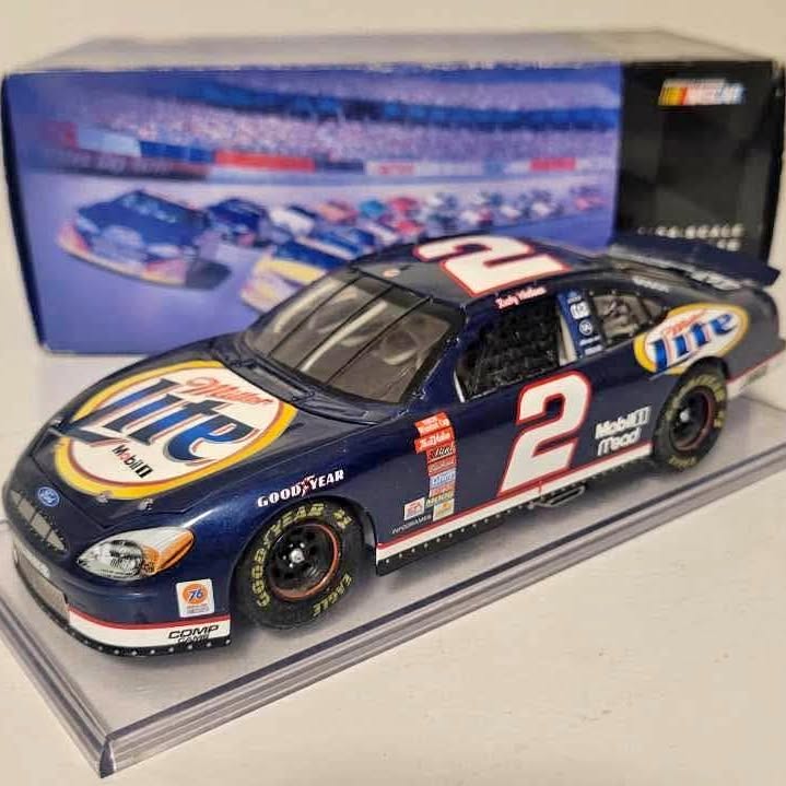 Blue NASCAR diecast car with black wheels, front view, #2 logo on hood