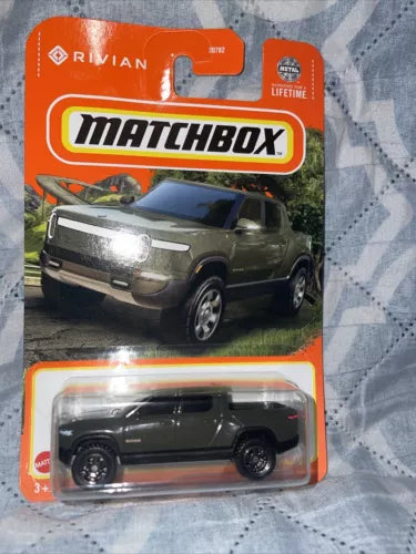 Green Matchbox diecast pickup truck in retail blister pack