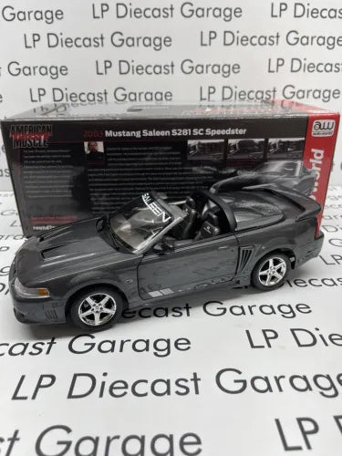 Dark gray speedster diecast model car with silver wheels and front grille