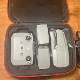 Drone accessory set in hard case: controller and spare batteries