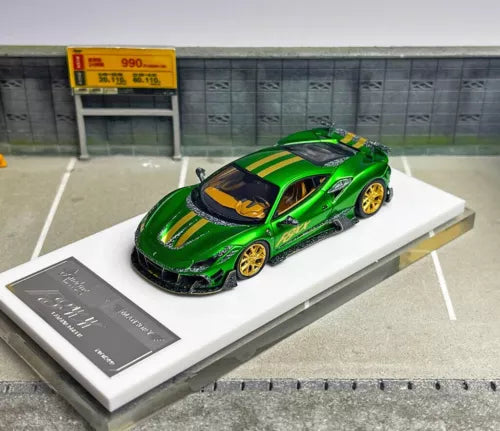 Green racing sports diecast car model with black hood and yellow stripes
