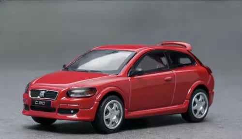 Red 1/64 scale diecast Volvo C30 hatchback car model, front three-quarter view