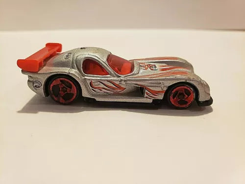 Silver and red diecast racecar toy with black wheels and front bumper detail