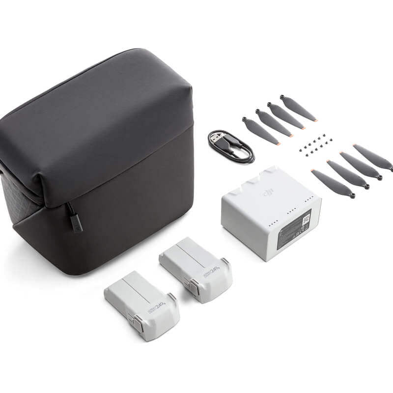 Drone battery and charging hub kit with black carry pouch, charger, two batteries