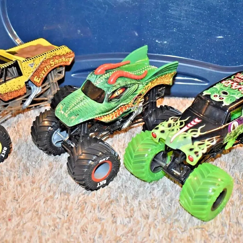 Set of 3 green monster jam diecast trucks with chunky black wheels
