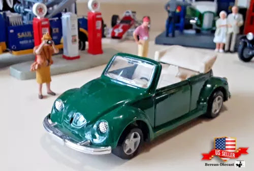 Green convertible diecast car toy with open top and chrome front, 1:36 scale