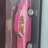 Pink diecast classic muscle car door and side detail with chrome handle and wheels