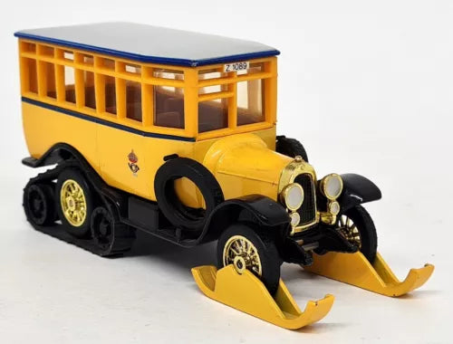 Yellow and black diecast post bus model with front grille and dual headlamps