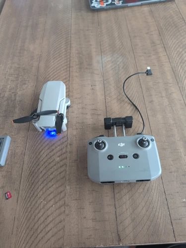 DJI Mini 2 drone with remote controller and antennas