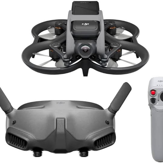Foldable dark gray FPV drone with front camera and top display module