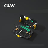 Custom flight controller PCB with green terminal blocks and yellow connectors