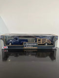 Diecast 1956 Ford F100 pickup truck with trailer, shown in display box