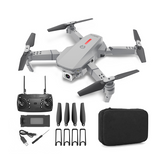 Foldable quadcopter drone with 4-blade rotors, controller, antennas, charger, case bag