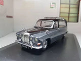 1:43 diecast hearse model car, dark grey with chrome grille and front lights
