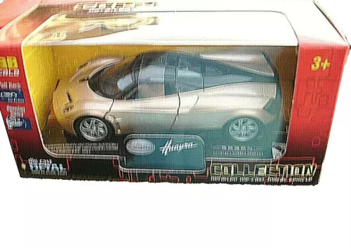 Diecast model car in box with clear window, blue and white sports car, scale 1/38
