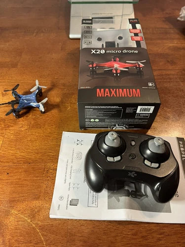 Micro quadcopter drone with wireless remote controller, in retail packaging