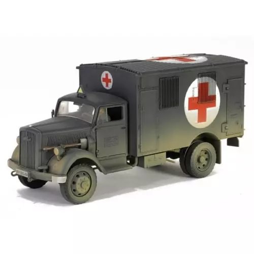 Green German-style emergency truck diecast model with red cross on side and rear