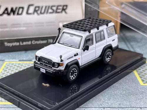 White Toyota Land Cruiser 70 diecast model car with front grille and roof rack