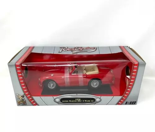 Red diecast Aston Martin DB2-4 MK III car in clear display box, 1:18 scale