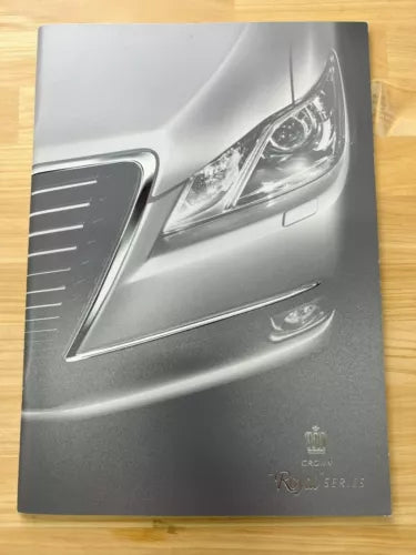 Silver 1:64 diecast car front with grille and headlights detail