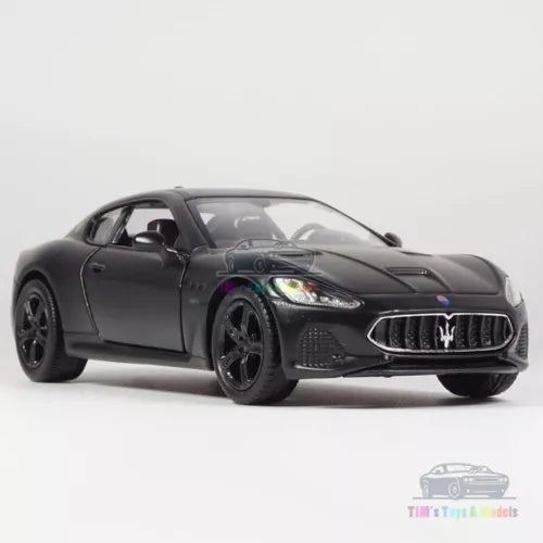 Black 1/36 diecast Maserati Gran Turismo model car with front grille and headlights
