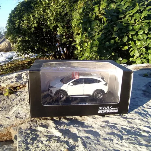 White SUV diecast model in display box with clear window
