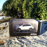 White SUV diecast model in display box with clear window
