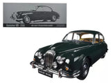 Green diecast classic sedan model car with chrome grille and front lights