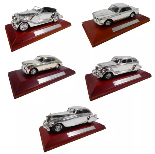 1:43 diecast car set with five silver/gray models on red display bases