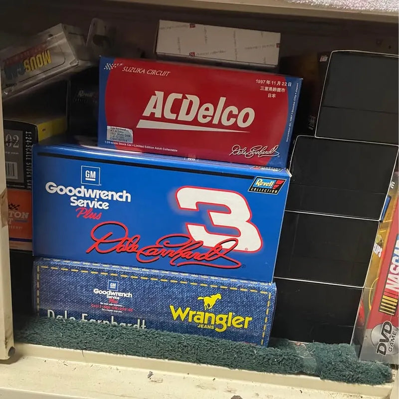 Diecast car display in retail box, blue and red racing graphics, ACdelco