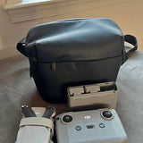 DJI Mini 2 controller with carrying case and drone accessories