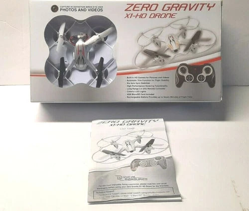 White quadcopter drone with remote control, shown in product packaging.