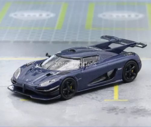 Blue diecast sports car model with front three-quarter view and black wheels