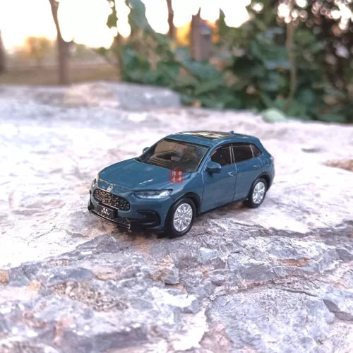 1/64 Honda ZR-V diecast model car, blue-gray, front 3/4 view