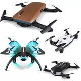 Foldable mini quadcopter drone with four rotors, brown body and black arms