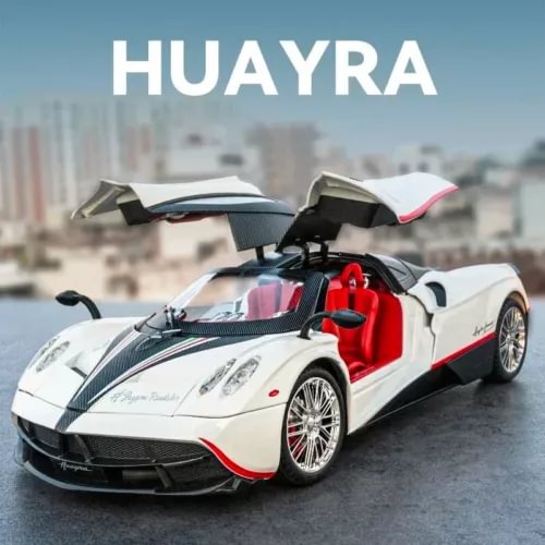 White, black, and red racing diecast supercar model, 1:32 scale