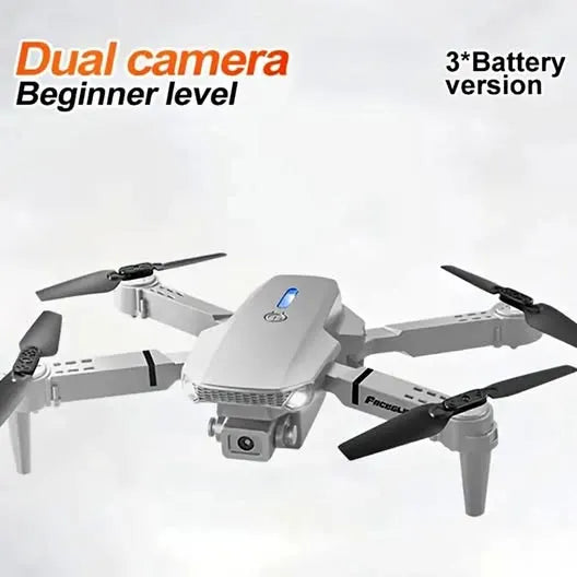 White quadcopter drone with dual camera module and four foldable propellers.