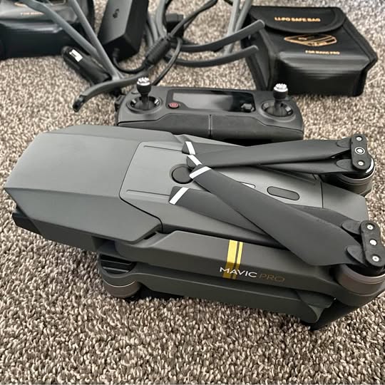Gray DJI Mavic Pro drone with front propellers attached