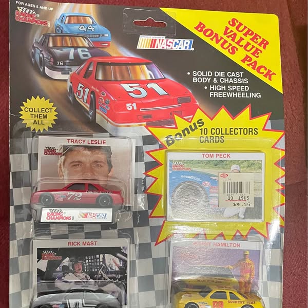 1:64 NASCAR diecast bonus pack with red #51 stock car, boxed cards and collectibles