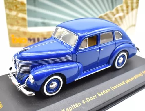 Opel Kapitan blue 1:43 scale four-door sedan diecast model, front 3/4 view