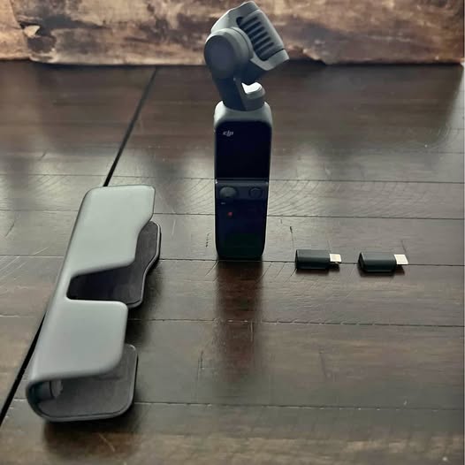 DJI Pocket 2 handheld gimbal camera with accessory mounts
