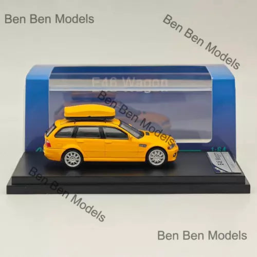 Yellow diecast wagon model car with wheels, in a clear display box