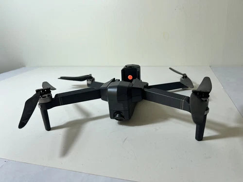 Black quadcopter drone body with four propellers