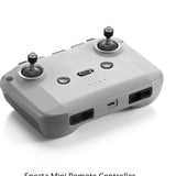 Gray mini drone remote controller with two joysticks and side ports
